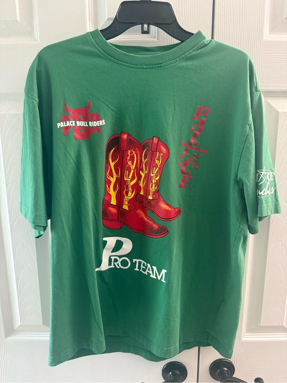 PALACE Green Tee with Red & Yellow Cowboy Boot Graphic